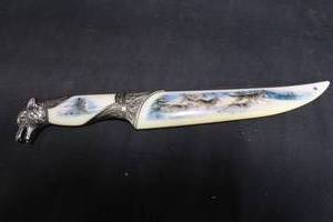 lot 96 image: DECORATIVE WOLF KNIFE