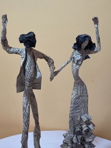 lot 107 image: Paper Mch Dancing Couple by Elbio Gutirrez