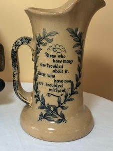 lot 130 image: Two Fun Items A Decorative Wooden Wall Mask and Douton Burslem Pottery Pitcher