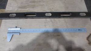 lot 141 image: 24 Vernier Caliper and Level