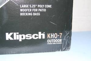 lot 106 image: New Pair of Klipsch Synergy Series KHO-7 Premium Indoor - Outdoor  All-Weather Audio Speakers