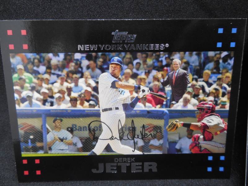 lot 216 image: (2) 2007 Topps Derek Jeter with Mantle & Bush in The Background. Super Short Print Card