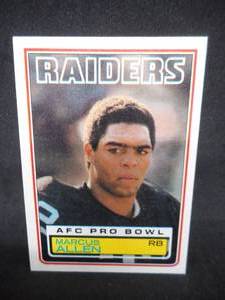 lot 13 image: 1983 Topps Marcus Allen Rookie Card #294 Near Mint Raiders