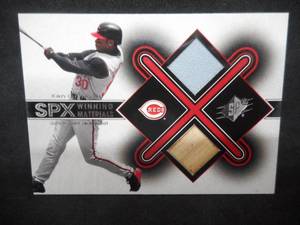 lot 24 image: 2001 SPX Winning Materials Game Used Jersey And Bat Card Ken Griffey Jr.