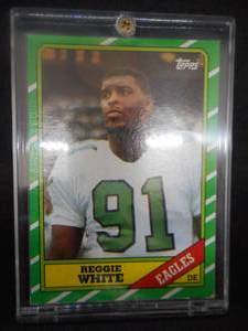 lot 125 image: 1986 Topps Reggie White Rookie Card #275 Near Mint LK
