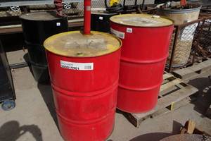 lot 66 image: 2 Steel Drums Rotella T6 HD 5W-40 Oil - 1 Full, 1 with Pump