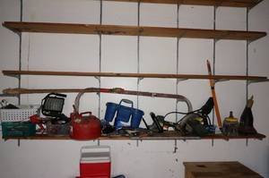 Contents of Shelf - Ladder Stabilizer, Tools, Work Light