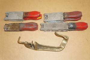 lot 17 image: Vintage Herters Jig Molds and a Fly Tying Clamp