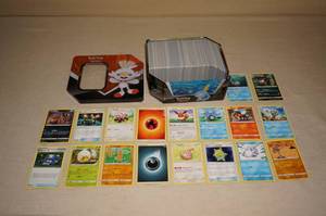 lot 53 image: Metal Tin of Pokemon Cards