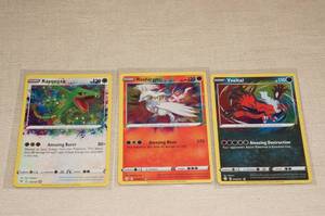 lot 60 image: 3 Amazing Rares Pokemon Cards - Yveltal, Reshiram, Rayquaza