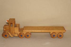 lot 104 image: Large Wood Semi Truck Cribbage Board