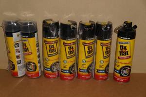 lot 148 image: 7 Cans of Fix-A-Flat - 6 Standard Tire, 1 Large