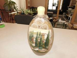 lot 27 image: Decorative Citrus Vinegar Bottle