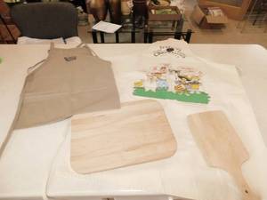 lot 37 image: 2 Aprons  2 Wood Cutting Boards