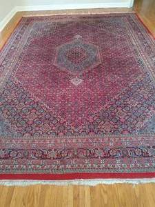 lot 129 image: Red Area Rug