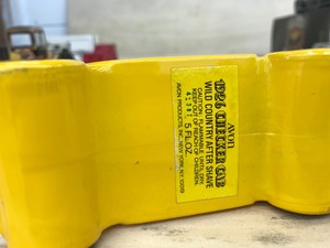 Yellow avon taxi cab cologne bottle