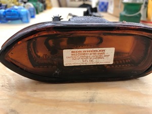 amber glass ship cologne bottle