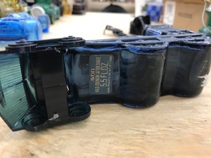 blue glass train cologne bottle