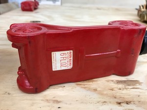 Red Avon cologne bottle