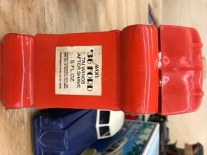 orange car cologne bottle