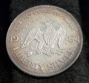 1 TROY OZ. .999 FINE SILVER 1984 A-MARK LIBERTY ROUND
