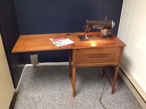 lot 9 image: Vintage Kenmore Sewing Machine & Cabinet