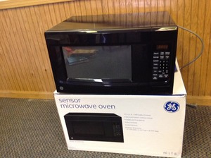 lot 97 image: GE Microwave Oven