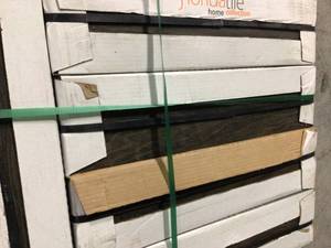 lot 7 image: Pallet with 23 cases of  Burlington Walnut 6 in. x 24 in. Porcelain Floor and Wall Tile (14 sq. ft.  case) not used