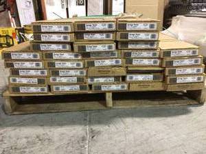 lot 17 image: Pallet with 34 cases of American Home Hickory Greige Twist 6.5 in. x 48 in. Glue Down Luxury Vinyl Plank (34.66 sq. ft.  case)