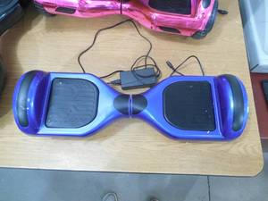 lot 1 image: NHT Pro Hoverboard
