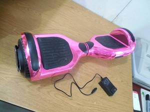 lot 2 image: AOB 36V HoverboardSelf-Balancing Scooter with Bluetooth Speakers  Pink Chrome
