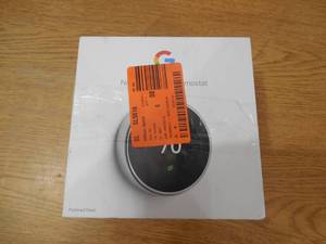 lot 37 image: Nest Learning Thermostat 3rd Gen in Polished Steel by Google