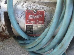 lot 21 image: Milwaukee Electric Chain Saw