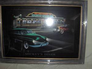 Mickeys diner print by Helen Flint. 29 x 41. Still has stretch wrap on frame. As shown.