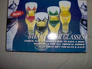 Bikini glasses. 4 12 oz glasses. New in box. As shown.