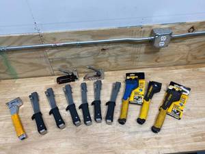 lot 63 image: Lot of 12 Staplers (various brands and models)