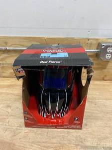 lot 89 image: LINCOLN ELECTRIC Red Fierce Auto Darkening Welding Helmet Variable Shade 7-13 with Grind Mode