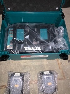 MAKITS 18-VOLT X2 LXT LITHIUM-ION (36-VOLT) BRUSHLESS CORDLESS 6-12 IN. PLUNGE CIRXULAR SAW W(2) BATTERIES 5AH, 55T BLADE. SEE PICTURES