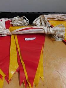 lot 37 image: 4 - 100 Yellow & Red String Flag Banners