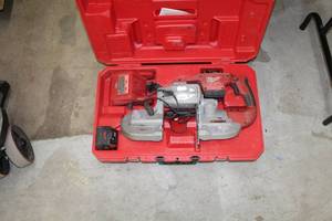 lot 320 image: Milwaukee 28V Cordless Band Saw 0729-20  with Battery, Charger, Case