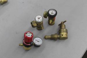 lot 600 image: Lot of (4) Gas Torch Accessories  with Torch Regulator Gauges (x3), Shut-Off Valve (x1)