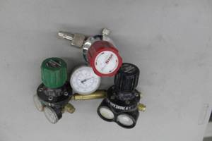 lot 599 image: Lot of (3) Compressed Gas Regulator Gauge Set  with Inert Gas 3000psi, ProStar, Victor Edge Series Professional Oxygen Gas 3000psi