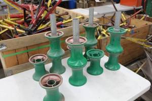 lot 633 image: Lot of (16) Industrial Equipment  with Greenlee Haines Roller 31931 6Dx7W (x12),  Poles 1-34Dx20L (x4)