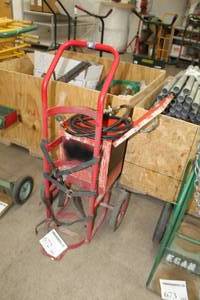 lot 672 image: Welding Dolly 2-wheel Red 20-12Wx20Dx42H  with Tank Straps, Welding Hose