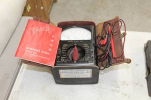 lot 768 image: Vintage Triplett Volt-Ohm-Milliameter 630  with Leather Case, Instruction Manual