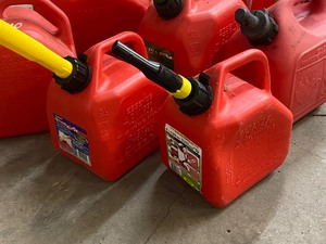 lot 40 image: Lot Of (9)  Assorted Gas Cans