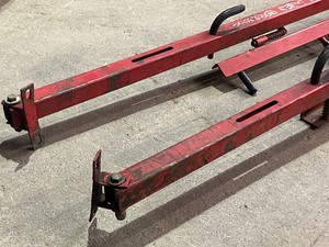 lot 24 image: Lot Of (2) Gear Caddy Adjustable Weed-Whip Carrier Rack Pieces