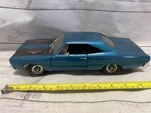 lot 34 image: Ertl 1969 Plymouth Road Runner 118 Metallic Blue Black (Sold $69 Ebay)