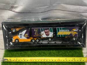 lot 64 image: NFL Minnesota Vikings Double Semi Truck Diecast