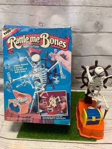 lot 94 image: Rattle Me Bones Game as Shown